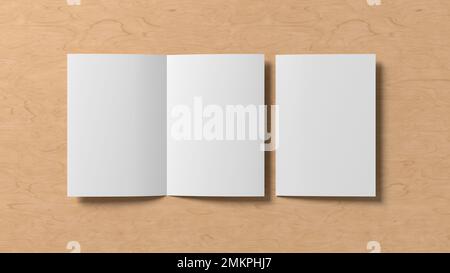 Half-folded flyer A4 booklet mock up on wooden background Stock Photo