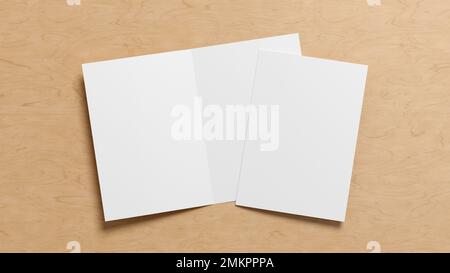 Half-folded flyer A4 booklet mock up on wooden background Stock Photo