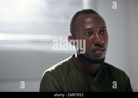 Portrait of pensive depressed soldier suffering from ptsd Stock Photo