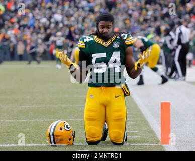 Green Bay, WI, USA. 30th Sep, 2018. Green Bay Packers linebacker James  Crawford #54 tackles Buffalo Bills running back Taiwan Jones #26 during the  NFL Football game between the Buffalo Bills and