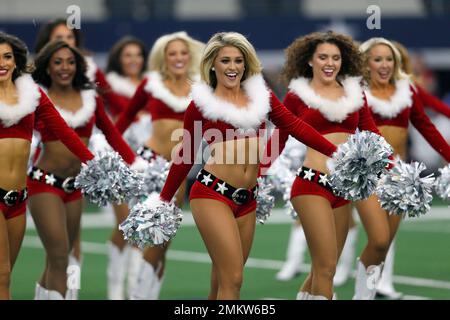 The Dallas Cowboys Cheerleaders perform wearing a holiday costume during an  NFL football game against the Tampa Bay Buccaneers on Sunday, Dec. 23,  2018, in Arlington, Texas. (AP Photo/Ron Jenkins Stock Photo 