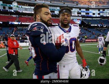 Buffalo Bills tight end Jason Croom (80) and offensive guard Wyatt Teller  (75) motion for a touchdown after Croom recovered a fumble in the end zone  against the New York Jets during