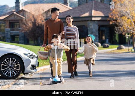 A young couple with children here Stock Photo