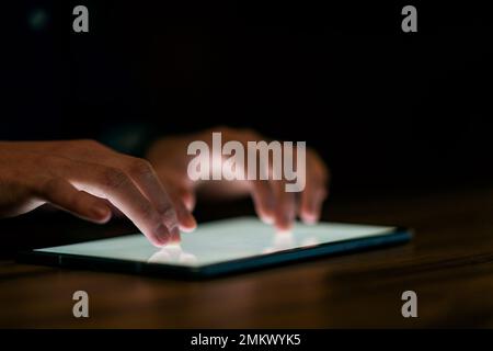 Unrecognizable guy touching empty blank digital pad screen Stock Photo