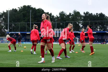 Liverpool’s Megan Campbell and team-mates warm up on the pitch before the Vitality Women's FA Cup fourth round match at Kingsmeadow, London. Picture date: Sunday January 29, 2023. Stock Photo