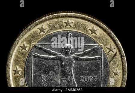 Italian 1 Euro coin on a 10 Euro note Stock Photo - Alamy