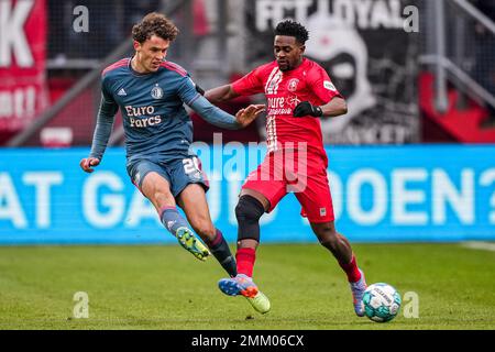 Enschede - Mats Wieffer of Feyenoord, Virgil Misidjan of FC Twente during the match between FC Twente v Feyenoord at De Grolsch Veste on 29 January 2023 in Enschede, Netherlands. (Box to Box Pictures/Tom Bode) Stock Photo