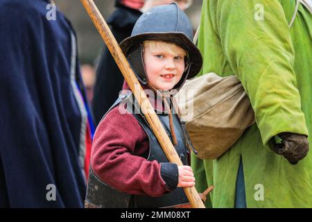 London, UK. 29th Jan, 2023. A young boy takes part in the event. Volunteers and soldiers of the King's Army, the Royalist part of the English Civil War Society, march down The Mall and via Horse Guards to Banqueting House in Westminster to commemorate King Charles I. The re-enactment takes place each year on the last Sunday to mark the anniversary of King Charles I's beheading outside Banqueting House. Credit: Imageplotter/Alamy Live News Stock Photo