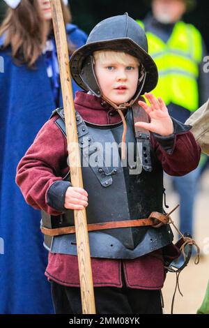 London, UK. 29th Jan, 2023. A young boy takes part in the event. Volunteers and soldiers of the King's Army, the Royalist part of the English Civil War Society, march down The Mall and via Horse Guards to Banqueting House in Westminster to commemorate King Charles I. The re-enactment takes place each year on the last Sunday to mark the anniversary of King Charles I's beheading outside Banqueting House. Credit: Imageplotter/Alamy Live News Stock Photo