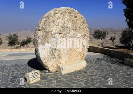 The Abu Badd rolling stone, a fortified door of a Byzantine monastery in the old village of Faysaliyah, Mount Nebo, Jordan, Middle East Stock Photo