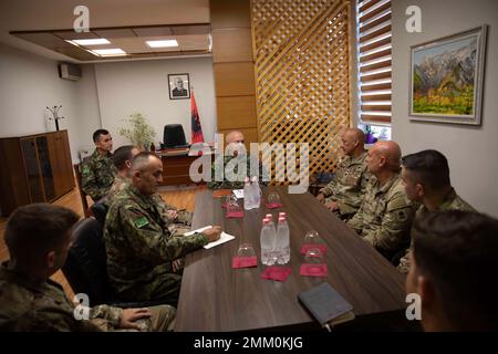 Brigadier General Ferdint Dimo, Deputy Commander of the Land Force, Albanian Armed Forces, greets leaders of the New Jersey Army National Guard at Land Forces Headquarters, Zall-Herr, Tirana, Albania, on September 13. The N.J. National Guard sent over 30 Soldiers in support of the Albanian Armed Forces upcoming NATO Validation Exercise as part of their State Partnership Program that has lasted over 20 years and conducted more than 500 military-to-military events. Stock Photo