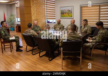 Brigadier General Ferdint Dimo, Deputy Commander of the Land Force, Albanian Armed Forces, greets leaders of the New Jersey Army National Guard at Land Forces Headquarters, Zall-Herr, Tirana, Albania, on September 13. The N.J. National Guard sent over 30 Soldiers in support of the Albanian Armed Forces upcoming NATO Validation Exercise as part of their State Partnership Program that has lasted over 20 years and conducted more than 500 military-to-military events. Stock Photo