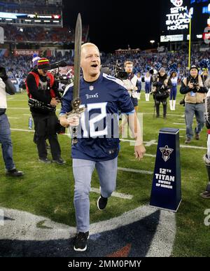 The Sword of Honor is moved to the field before the first half of an NFL  football game between the Tennessee Titans and the Jacksonville Jaguars,  Thursday, Dec. 6, 2018, in Nashville