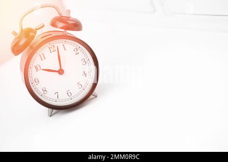 Black alarm clock on white background, copy space Stock Photo