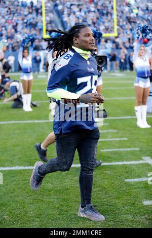 Taj George, wife of former Tennessee Titans running back Eddie George,  sings the national anthem before an NFL football game between the Titans  and the Indianapolis Colts Sunday, Sept. 15, 2019, in