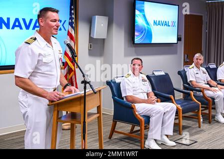 Capt. Benjamin Van Buskirk gives his final remarks as NavalX Director before handing the reins over to Capt. Casey Plew during the change of office ceremony.     NavalX serves the U.S. Navy and Marine Corps as an innovation and agility cell, supporting and connecting initiatives across the DoD. The organization enables collaboration; accelerates the pace of discovery, learning and experimentation; and fosters the naval workforce’s capacity for innovation and agility. It gives Sailors, Marines and DoN civilians valuable tools, training and resources for solving problems and translating ideas in Stock Photo