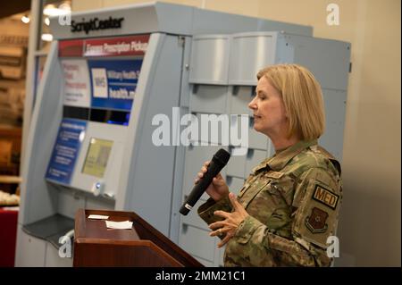Lt. Col. Krista Hutchinson, 2nd Healthcare Operations Squadron commander, introduces the new ScriptCenter kiosk during a ribbon cutting ceremony for the pharmacy at Barksdale Air Force Base, Louisiana, Sept. 13, 2022. The kiosk provides pharmacy patients with the option to pick up eligible medications in the Base Exchange lobby during BX business hours. 2BW,AlwaysReady,Louisiana,Pharmacy,ScriptCenter,StrikerCulture,StrikerNation,innovate, Stock Photo