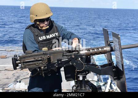 220913-N-N3764-1004  CARIBBEAN SEA - (Sept. 13, 2022) – Chief Select Gunner’s Mate Zach Morrill loads an M2A1 .50-caliber machine gun during a crew serve weapons shoot aboard the Freedom-variant littoral combat ship USS Billings (LCS 15) in the Caribbean Sea, Sept. 13, 2022. Billings is deployed to the U.S. 4th Fleet area of operations to support Joint Interagency Task Force South’s mission, which includes counter-illicit drug trafficking missions in the Caribbean and Eastern Pacific. Stock Photo