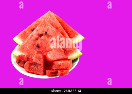 Sliced watermelon on the plate on an isolated background copy space Stock Photo