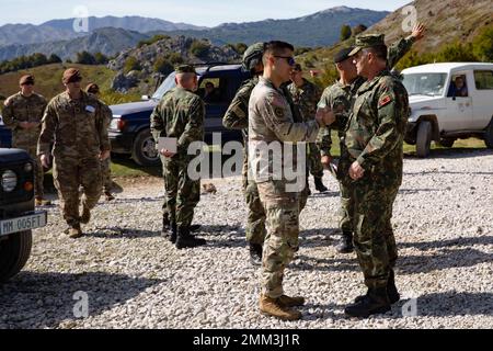 New Jersey Army National Guard Capt. London Nagai, Bilateral Affairs Officer, shares a handshake with Brig. Gen. Arben Kingji, Albanian Chief of Defence, in Biza, Tirana, Albania, September 14. As part of the U.S. Department of Defense State Partnership Program, the New Jersey National Guard sent more than 30 Soldiers to participate in various military-to-military events this week as the Albanian Armed Forces conduct their NATO Validation Exercise. Stock Photo