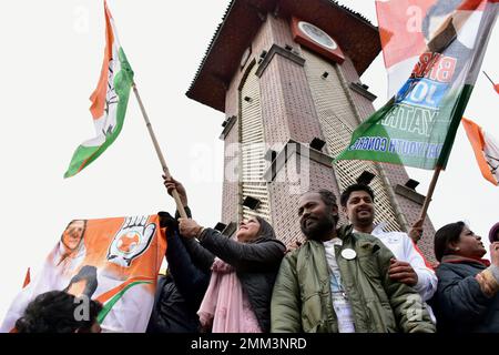 Srinagar, India. 29th Jan, 2023. Supporters of Indian National Congress hold party flags as they gather at the city centre during a 'Bharat Jodo Yatra' march in Srinagar. Congress leader Rahul Gandhi resumed his 'Bharat Jodo Yatra' in Srinagar on Sunday, as the foot march entered its last day. Gandhi, along with his sister were joined by hundreds of Congress supporters, including women, who were seen carrying the tricolour and party flags. Credit: SOPA Images Limited/Alamy Live News Stock Photo