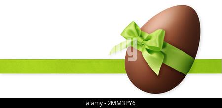 Happy Easter decoration chocolate egg with light green shiny ribbon bow, isolated on white background. Template for label, gift greeting card, promoti Stock Photo
