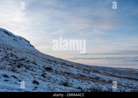 Aircraft vapour trails creating giant circles in the sky, possibly in a holding pattern, Yorkshire Dales National Park, England, UK Stock Photo