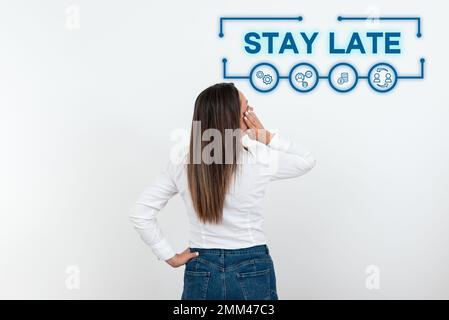 Hand writing sign Stay Late. Business concept A routine in which a person goes to somewhere out of time Stock Photo