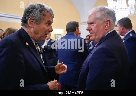 Sen. Sherrod Brown, left, speaks with Secretary of the Air Force Frank ...
