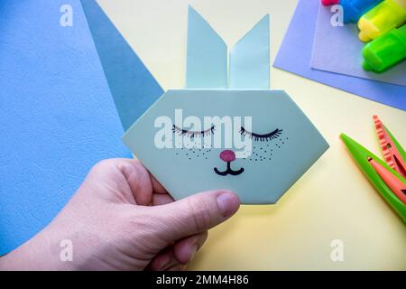 step by step how to make an origami rabbit Stock Photo
