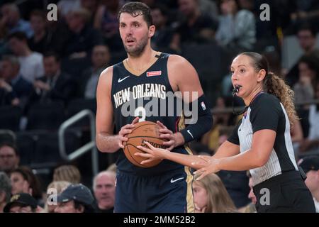 https://l450v.alamy.com/450v/2mm52b2/file-in-this-oct-5-2018-file-photo-referee-ashley-moyer-gleich-right-hands-the-ball-to-new-orleans-pelicans-forward-nikola-mirotic-3-during-the-second-half-of-an-nba-preseason-basketball-game-madison-square-garden-in-new-york-ashley-moyer-gleich-and-natalie-sago-are-among-five-officials-who-were-promoted-thursday-by-the-nba-to-full-time-status-making-them-the-fourth-and-fifth-women-in-league-history-to-have-that-designation-ap-photomary-altaffer-file-2mm52b2.jpg
