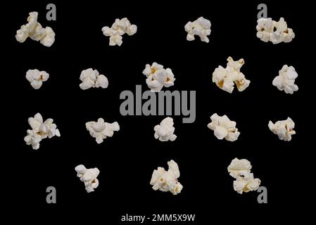 Popcorn set isolated on black background. Popcorn is suitable for creating levitation effect and design. Stock Photo