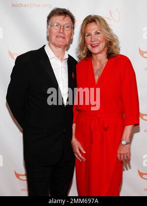 Steve Winwood, left, and Eugenia Winwood, right, attend the Michael J