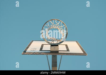 Basketball hoop with net on sports ground Stock Photo