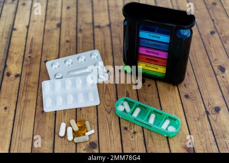 Weekly pills box for daily medication. Health care and pharmacy concept. High quality photo Stock Photo
