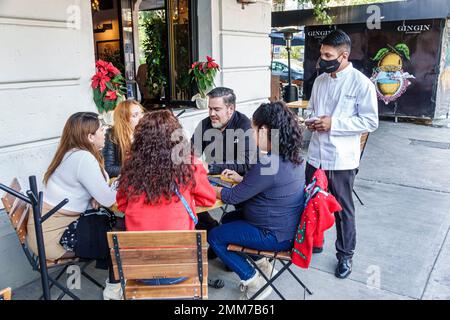 Mexico City,Avenida Alvaro ObregÃ³n Roma Norte Cuauhtemoc,ordering taking order,man men male,woman women lady female,adult adults,resident residents,c Stock Photo