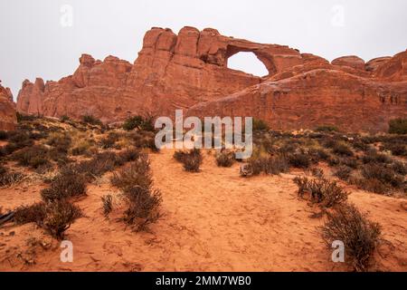 Skyline Arch is one of thousands of arches in Arches National Park in Utah, USA. Stock Photo