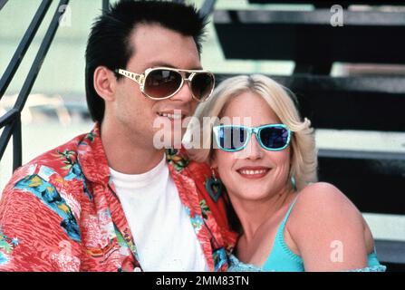 CHRISTIAN SLATER and PATRICIA ARQUETTE in TRUE ROMANCE 1993 director TONY SCOTT written by Quentin Tarantino and (uncredited) Roger Avary costume design Susan Backer music Hans Zimmer Morgan Creek Entertainment / Davis-Films / August Entertainment / Miramax / Sterling MacFadden / True Romance Productions Stock Photo