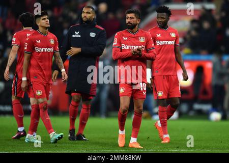 Leverkusen, Germany. 29th Jan, 2023. Soccer: Bundesliga, Bayer Leverkusen - Borussia Dortmund, Matchday 18 at BayArena, Leverkusen players leave after the defeat. IMPORTANT NOTE: In accordance with the requirements of the DFL Deutsche Fußball Liga and the DFB Deutscher Fußball-Bund, it is prohibited to use or have used photographs taken in the stadium and/or of the match in the form of sequence pictures and/or video-like photo series. Credit: Marius Becker/dpa/Alamy Live News Stock Photo