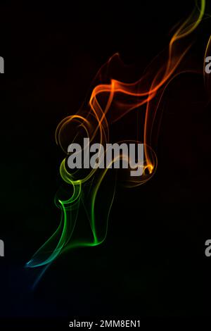 Abstract illustration based on smoke photography multicolored on black background Stock Photo