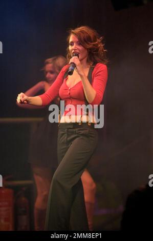 Danielle Jane 'Dannii' Minogue performing on stage at Glasgow, Scotland. Stock Photo