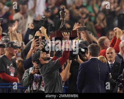 Boston Red Sox Series MVP Mike Lowell and teammate Alex Cora celebrate  after the World Series game four at Coors Field in Denver on October 28,  2007. The Boston Red Sox beat