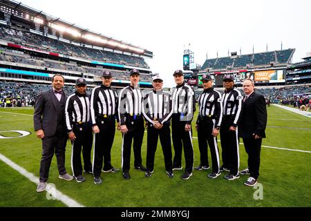 FOXBOROUGH, MA - AUGUST 11: Side judge Allan Baynes (56) confers