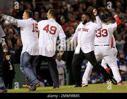 Boston Bruins hockey legend Bobby Orr, center, reaches out to former Boston Red  Sox's Bill Buckner, center, as former Red Sox's Dwight Evans, left, Red Sox  Chairman and co-owner Tom Werner, second