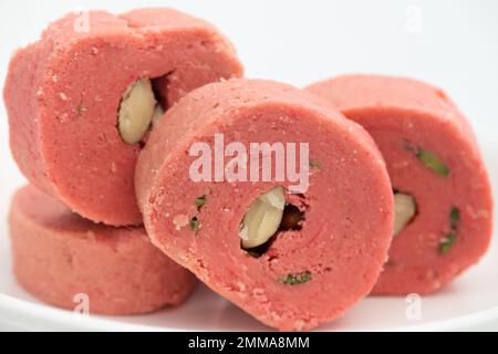 Indian Mithai Pink Kaju Rose Cake Cassata Or Kasata Is Made Of Cashew Nuts, Gulab, Dry Fruits, Badam, Almonds. Enjoyed On Holi, Diwali, Rakshabandhan, Stock Photo