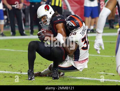 Former Denver Broncos defensive player Bill Romanowski looks on during a  halftime ceremony during an NFL football game between the Denver Broncos  and the Washington Commanders Sunday, Sept. 10, 2023, in Denver. (