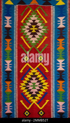 Fabric with multicolor ornaments Stock Photo