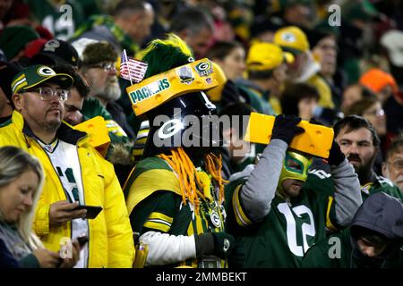 Green Bay Packers fans wear cheese hats while Buffalo Bills fans wear  chicken wing hats during the first half of an NFL football game against the  Buffalo Bills Sunday, Dec. 14, 2014