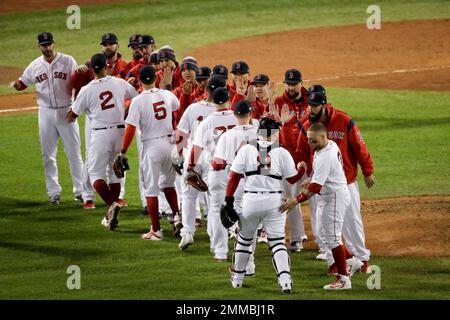 Boston Red sox fans celebrate a World Series win beating the St. Louis  Cardinals 3-0 at Busch Stadium in St. Louis on October 27, 2004. Boston  takes the World Championship for the