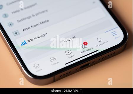 New york, USA - January 28, 2022: Using facebook ads manager on iphone 14 pro in smartphone screen close up view Stock Photo